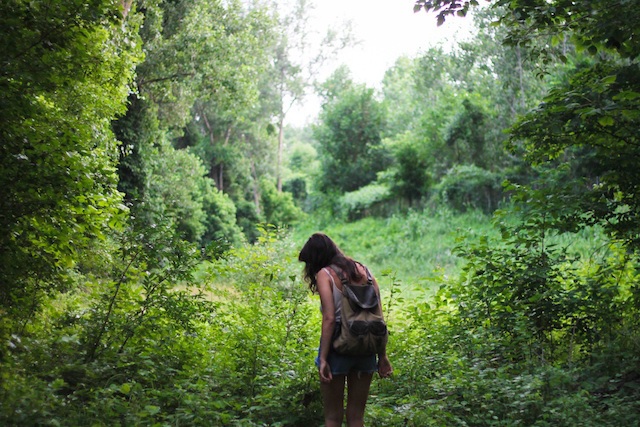 Girl Hiking and Wandering in Forest